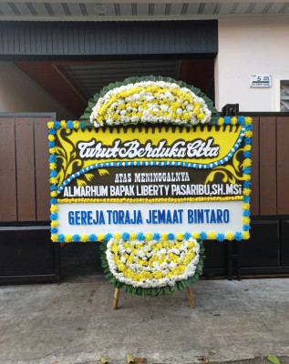 Papan Bunga Duka di Pulo